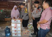 Polres T.Balai Gotong Royong Bersama Warga Sebatang Dan Salurkan Bansos